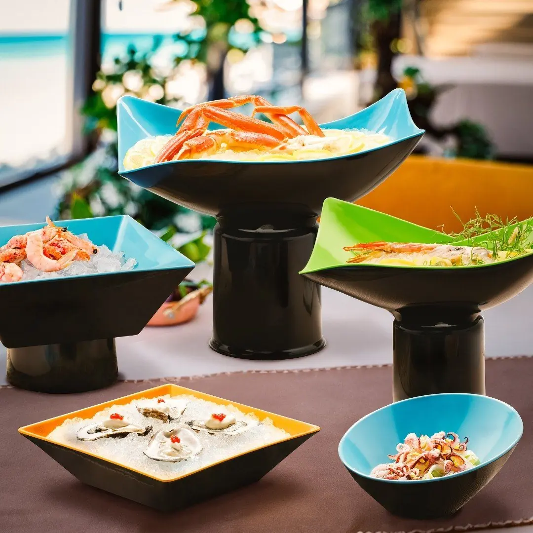 G.E.T. melamine serving pieces in black, white and teal
