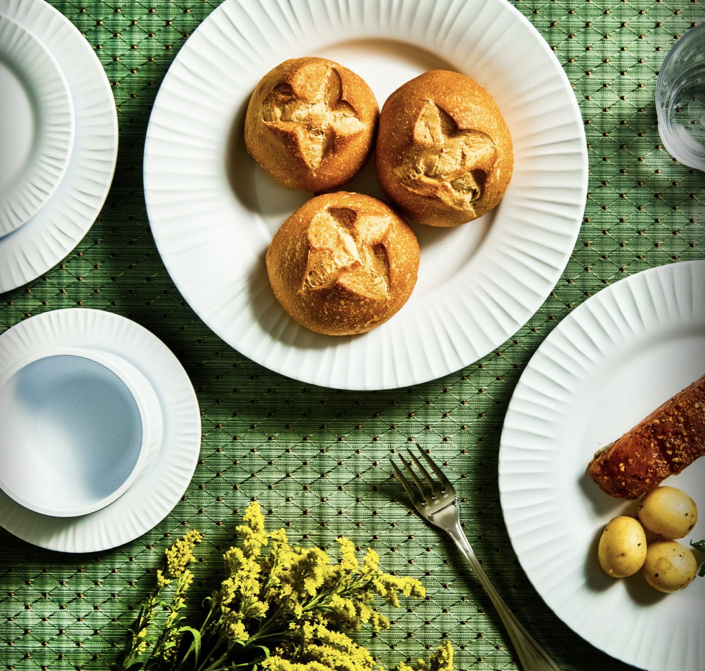 The G.E.T. Riva Maris matte white melamine collection on a set table